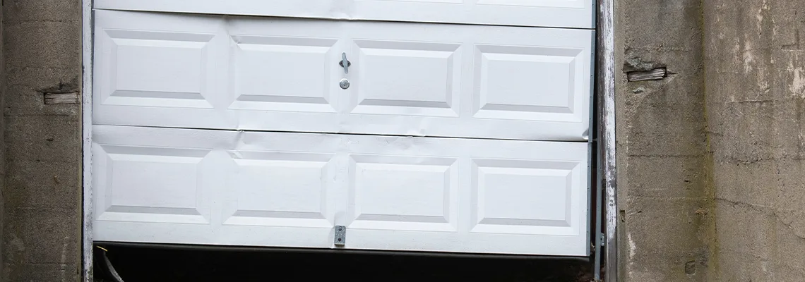 Garage Door Got Hit By A Car Dent Removal in Waterloo, ON