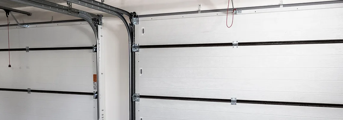 Fix Folding Garage Door Jerking in Waterloo, Ontario