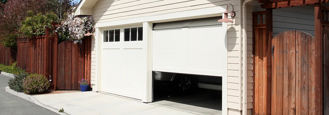 Fix Metal Garage Door Jerking in Waterloo, Ontario